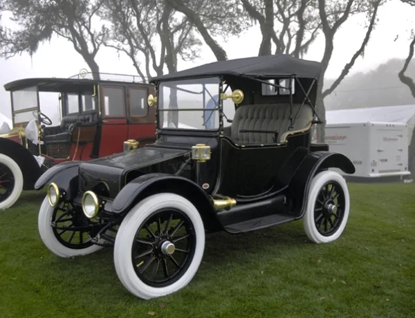 Restored black Baker Electric car at a vintage automobile show